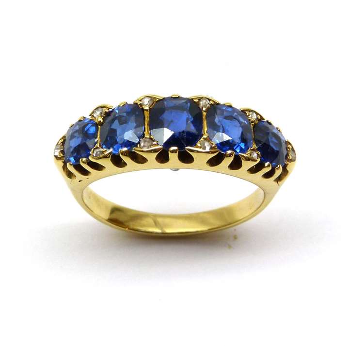 Antique sapphire five stone graduating half hoop ring